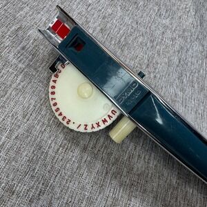 Vintage DYMO M-10 Label Maker Embosser Chrome Teal Handle 1 Wheel + 1 Tape